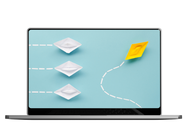 Laptop που δείχνει χάρτινα καραβάκια